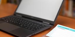 Online safety lesson for seniors with a simple checklist displayed on a laptop screen